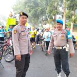 Personel Gabungan Polres Bima Kota Amankan Jalur Titik Start Fun Bike Festival Sangiang Api