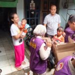 Tim Trauma Healing Polri Bersama Relawan Mahasiswa UI Hadir Bersama Warga Pascabanjir di Cilincing